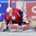 MALMO, SWEDEN - DECEMBER 26: Norway's Joachim Svendsen #1 goes down to play the puck during preliminary round action against Russia at the 2014 IIHF World Junior Championship. (Photo by Andre Ringuette/HHOF-IIHF Images)